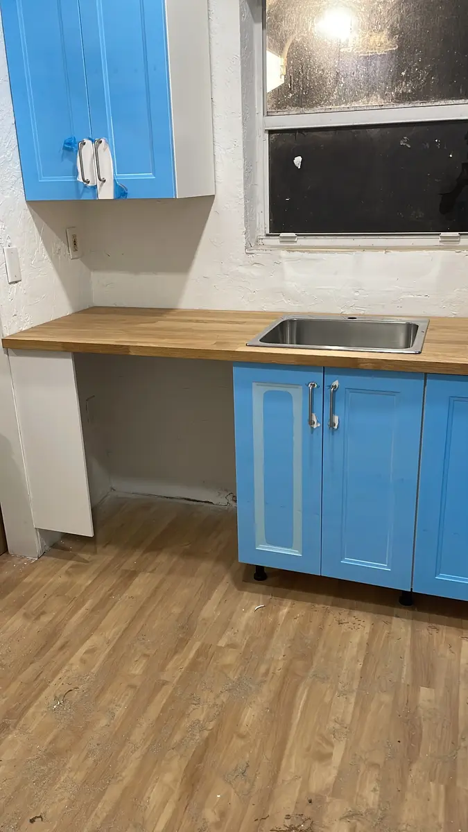 Sink cabinet area during a kitchen installation
